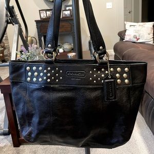 Black and Gold studded handbag.